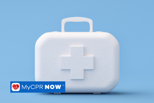 A white first aid kit on a blue background. 