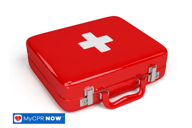 Bright red hard-shell first aid kit with white cross on top.