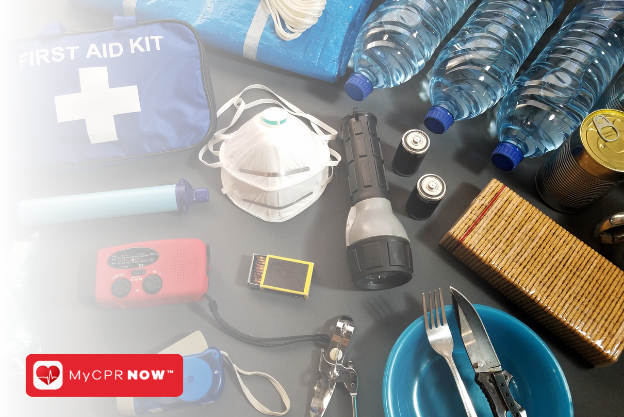 A first aid kit, mask, radio, flashlight, water bottles, and other supplies. 