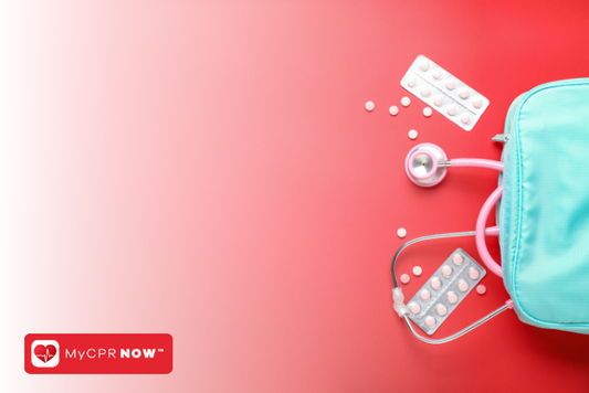Light blue first aid kit with a stethescope and pills coming out of it on a red background.