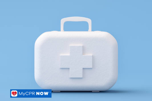 White first aid kit with a cross symbol on a light blue background.