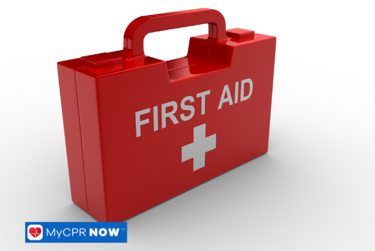 Red hard-shell first aid kit with a white cross and handle against a plain background