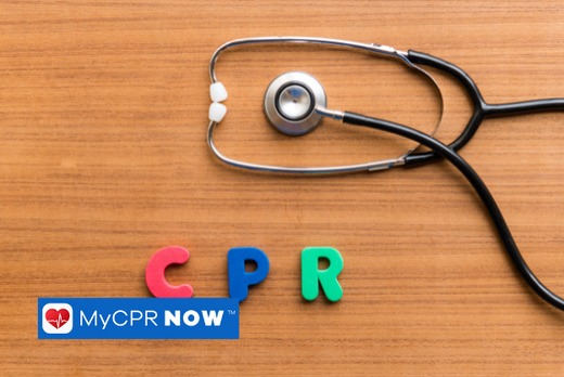Colorful letters that spell out CPR with a stethoscope above it on a wooden surface. 